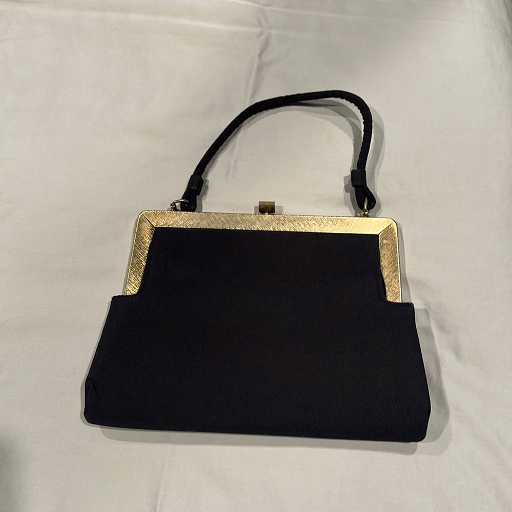 Vintage hinge open clutch, arm strap, black with bronze metal accents